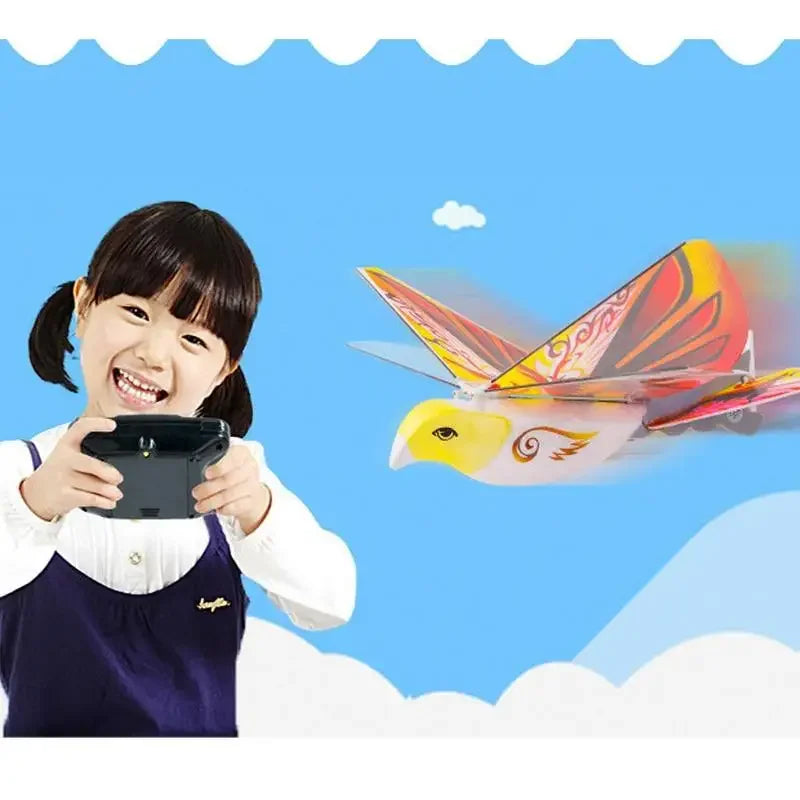 Electronic Flying Bird Drone Toy, Adjust the Rudder to Make the Flapping Wings Bird Fly, Mini RC Drone Helicopter 235x275x70mm 360 Degree Flying RC Bird Toys Remote Control E-Bird2.4 GHz - Toyigo