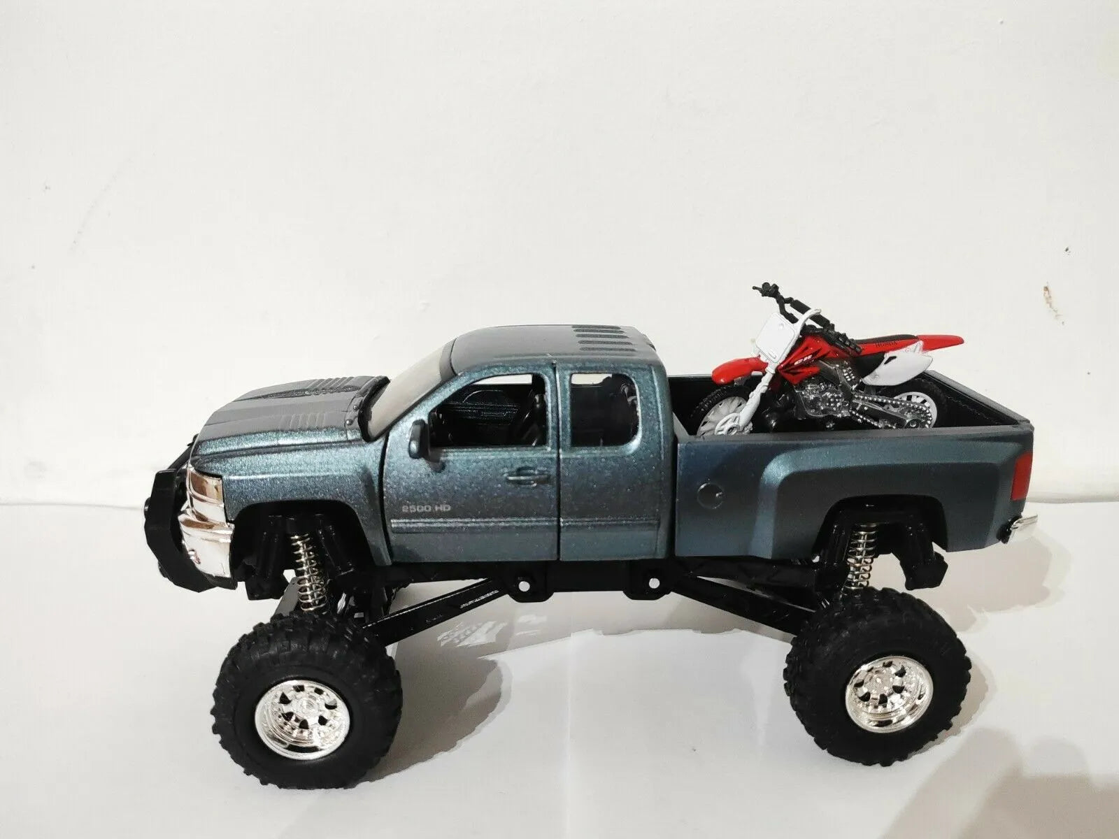 Pickup Truck, Chevrolet 4x4 Gray Silverado Pickup Truck Working Suspension and 1/32 Scale Die Cast Blue Chevrolet Silverado and Honda Dirt Bike For Kids - Toyigo