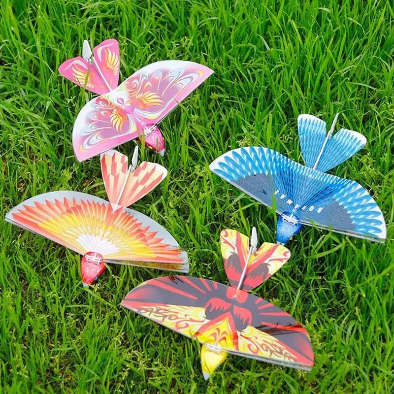 Electronic Flying Bird Drone Toy, Adjust the Rudder to Make the Flapping Wings Bird Fly, Mini RC Drone Helicopter 235x275x70mm 360 Degree Flying RC Bird Toys Remote Control E-Bird2.4 GHz - Toyigo