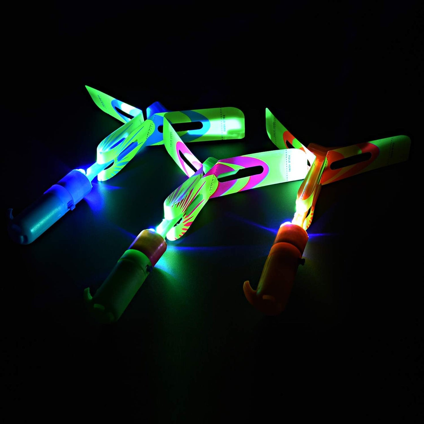 Rocket Slingshot Flying Toys with Led Lights, 12 Pcs Slingshot Toy for Kids, Summer Outdoor Game LED Slingshot with 12Pcs Launchers + 12Pcs Arrow Helicopters, Glow in The Dark Kids Party Supplies